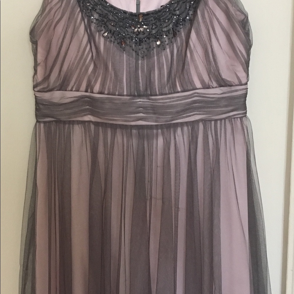 Knee length pink dress with grey overly tulle